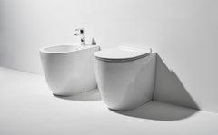 Sanitari Simas serie VIGNONI filo muro: vaso carenato con scarico  GREEN VERTIGO, sedile soft- clcose,bidet .